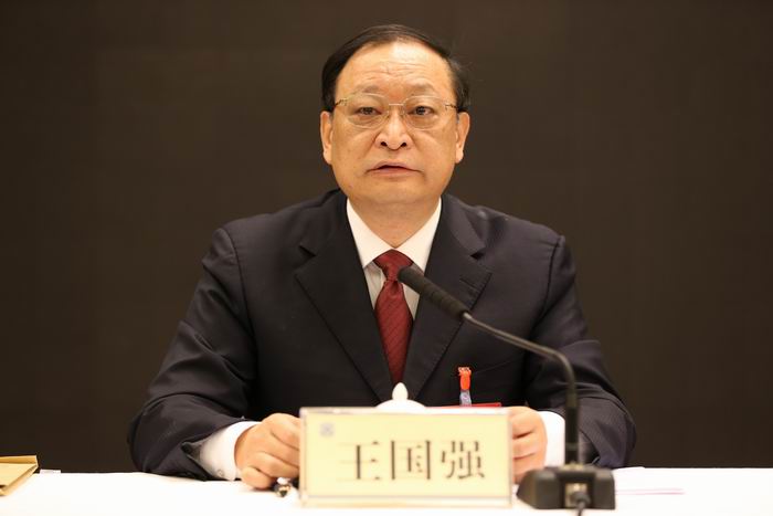 調整大小 國家衛(wèi)生和計劃生育委員會副主任、國家中醫(yī)藥管理局局長王國強作工作報告.JPG